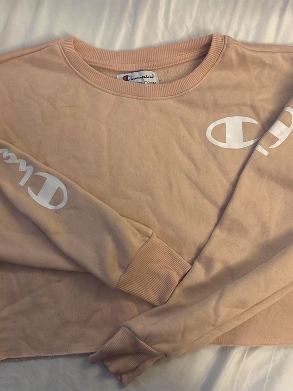 Champion tan & cream cropped shirt.
